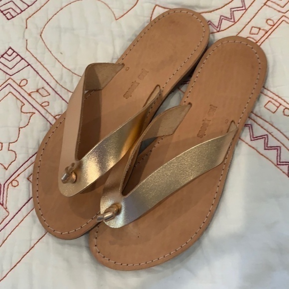 NWOT Rose gold leather flip flops from Greece